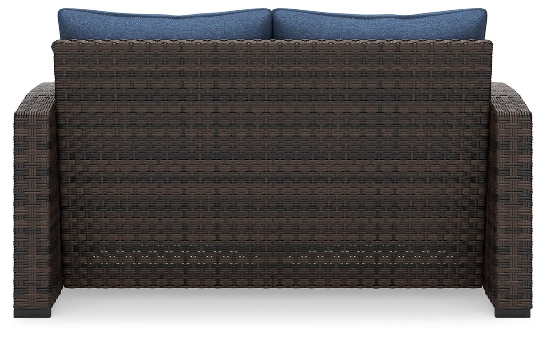 Windglow - Blue / Brown - Loveseat With Cushion